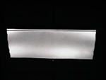 S110 - Panel below trunk lid for a coupe.